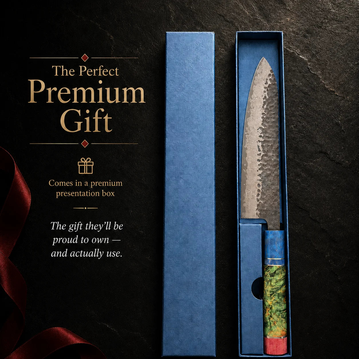 Kōri Damascus Chef Knife with decorative handle in a premium gift box on a dark background.